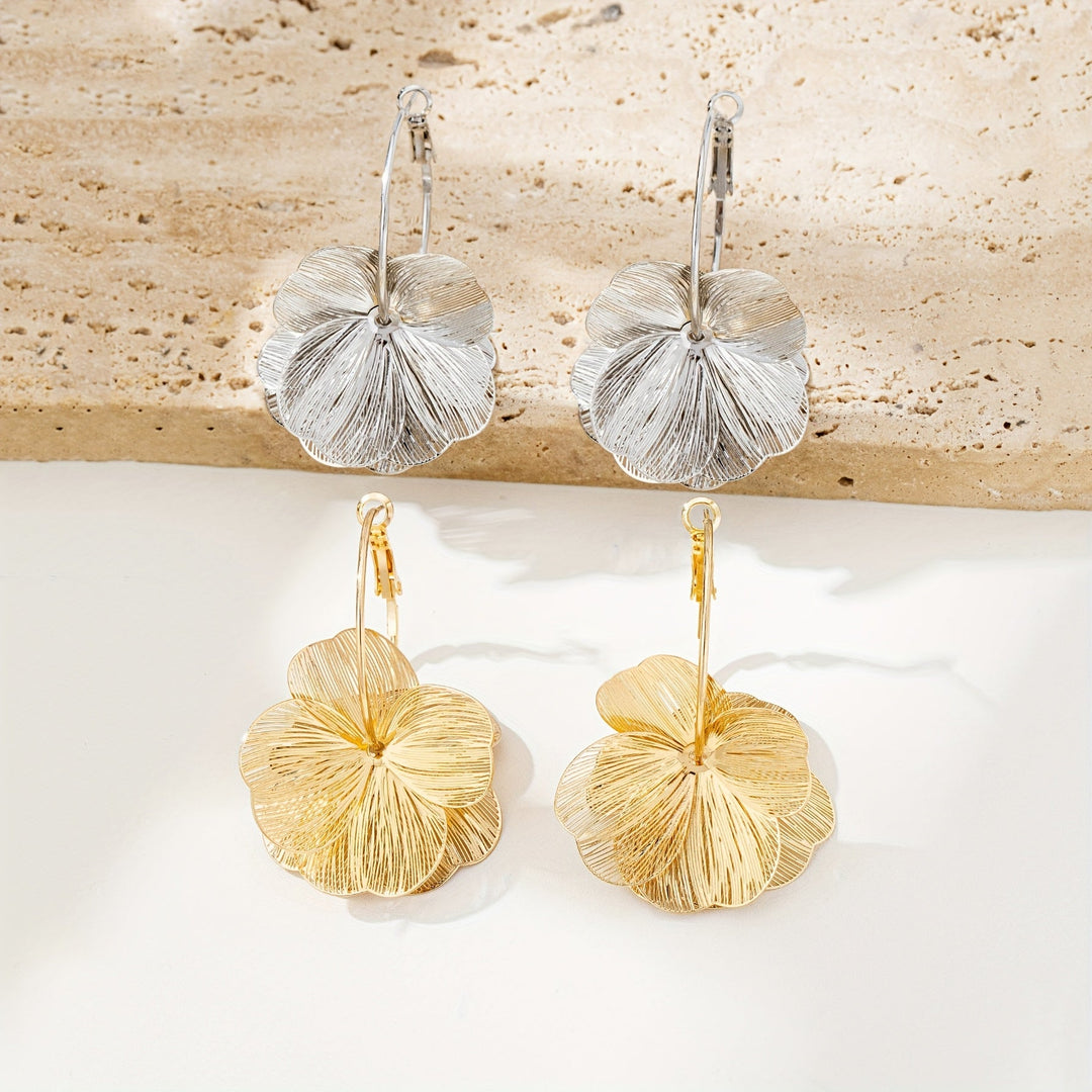 Přehnané zlaté duté náušnice